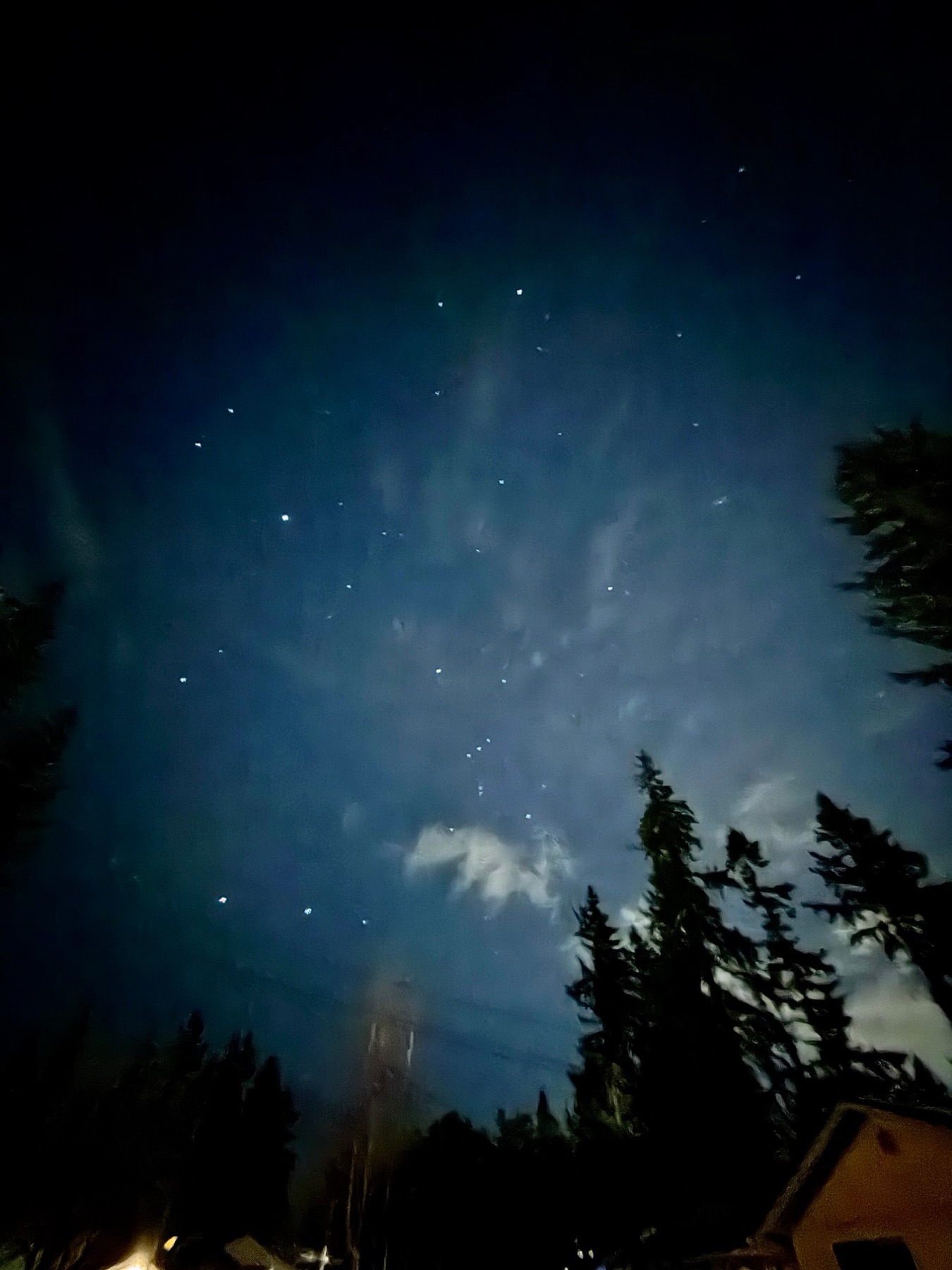 Stars through night clouds