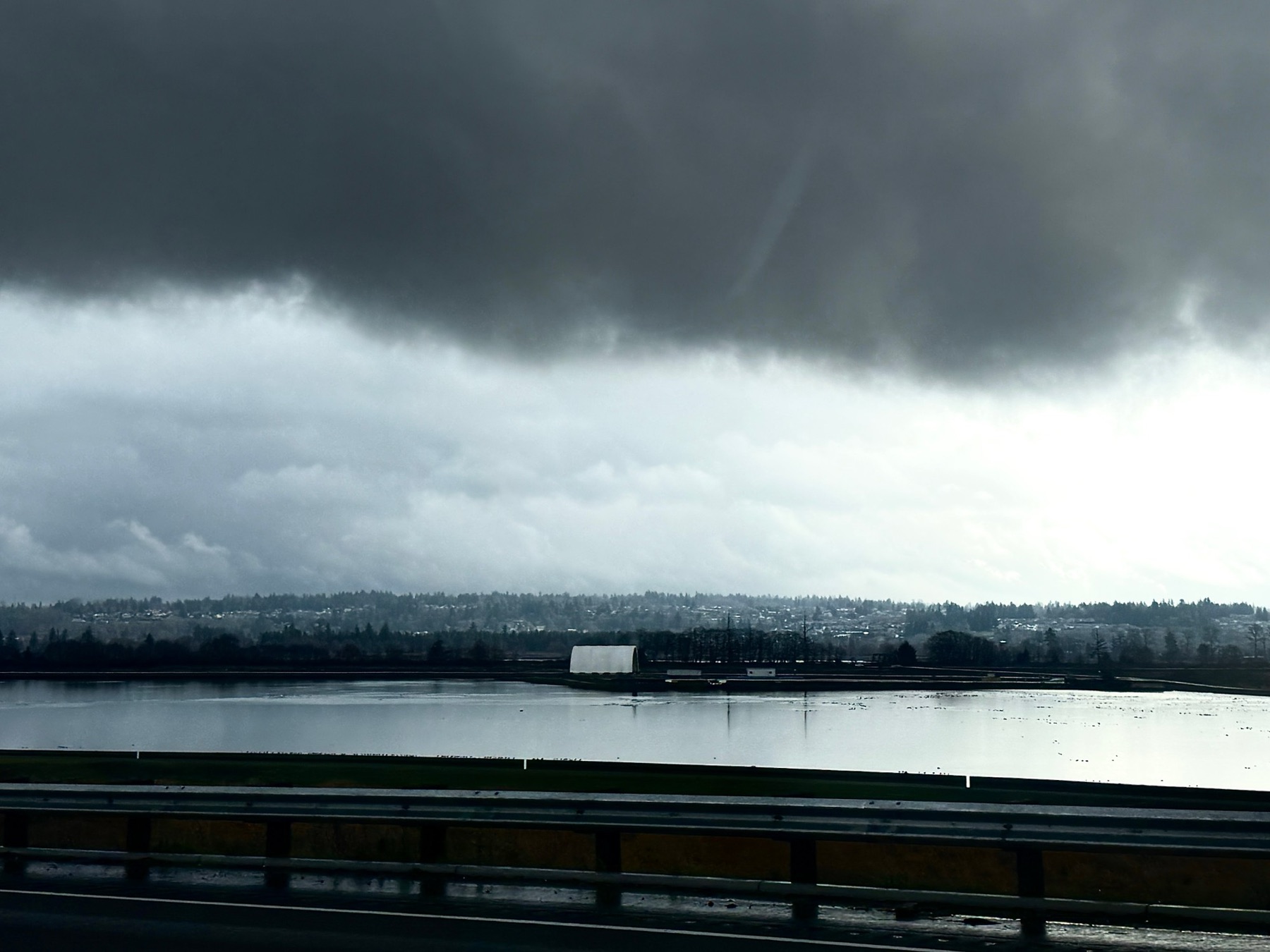 Storm light over flooded fields